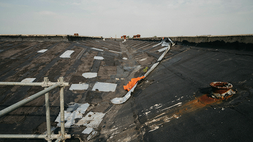 Commercial roof showing signs of damage in Regina